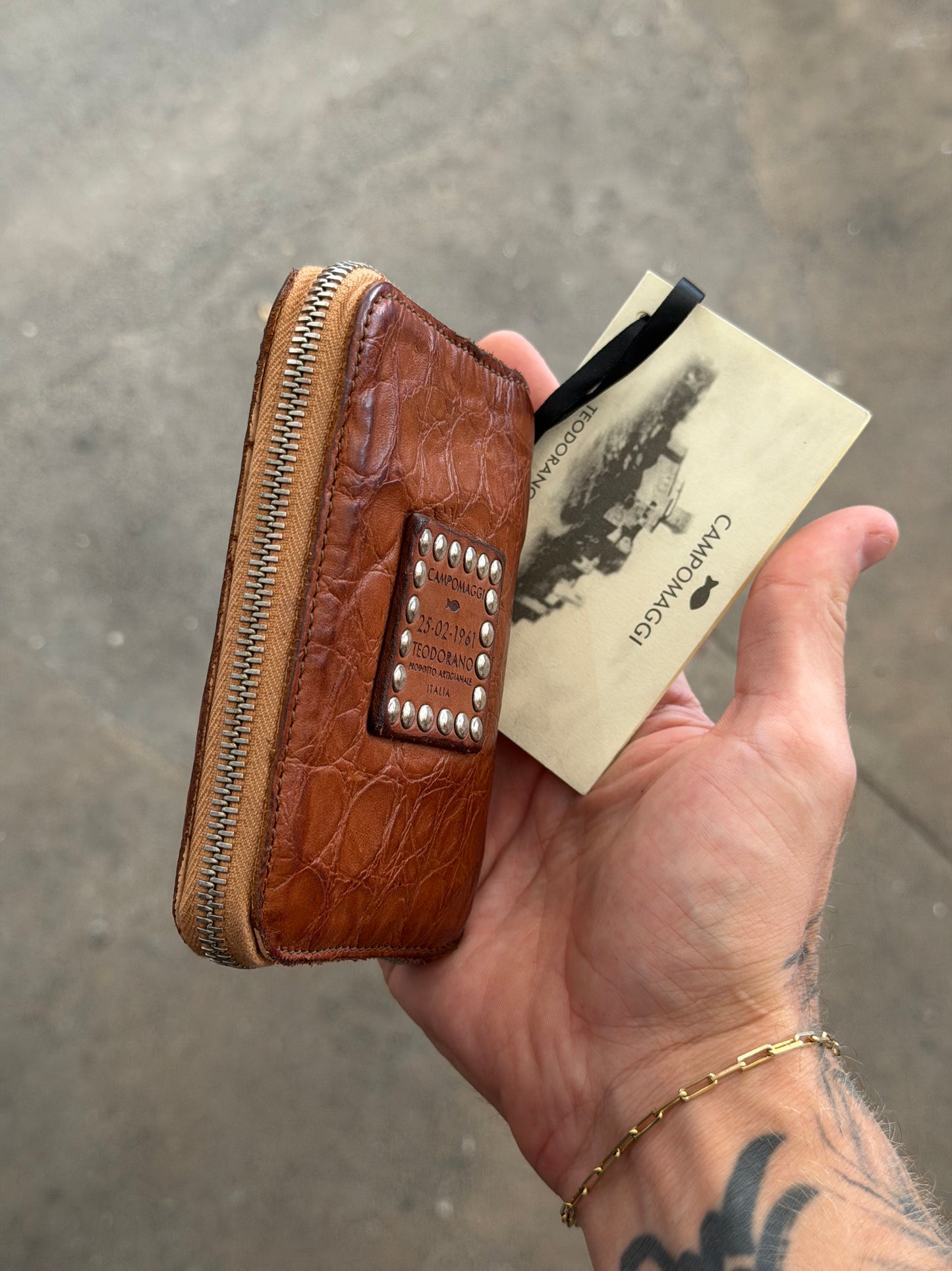 Campomaggi Leather Embossed Zip Bifold Wallet in Cognac